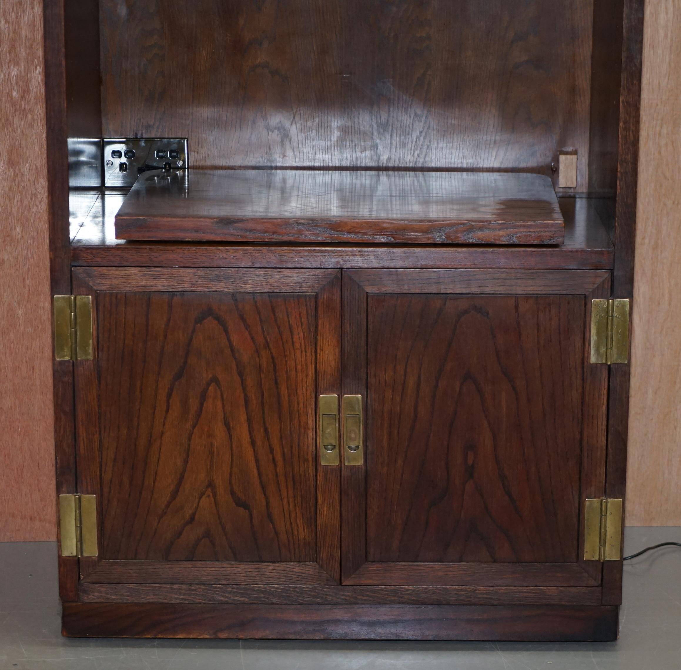 Henredon multimedia furniture military campaign with sliding TV stand and double socket.