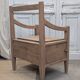 Antique armchair in raw wood