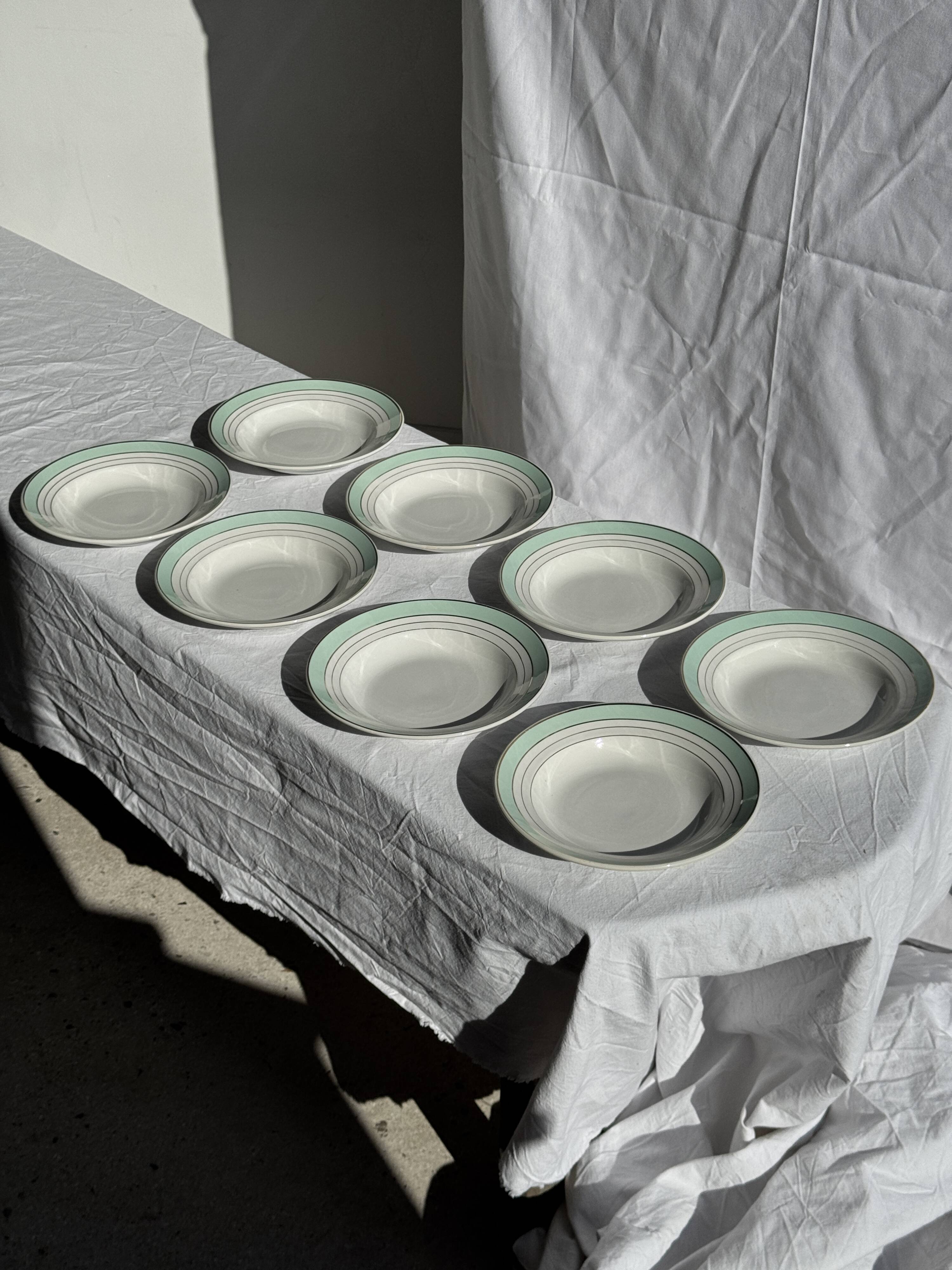 Set of 8 antique turquoise deep plates with a gold rim D22.5