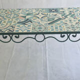 Table en fer forgé, en carreau de ciment