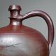 Large stoneware jar from Normandy with lustrous burgundy glaze, from the 1920s-30s.
