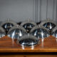 Suite de 8 cloches en inox service de table XXe
