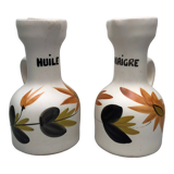 Old vinegar and oil maker with vintage decoration floral motifs