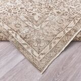 Tapis vintage à motifs floraux beige et marron