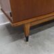 1960s teak sideboard with 4 drawers, 2 doors, and a mirror.