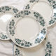 8 assiettes plates terre de fer