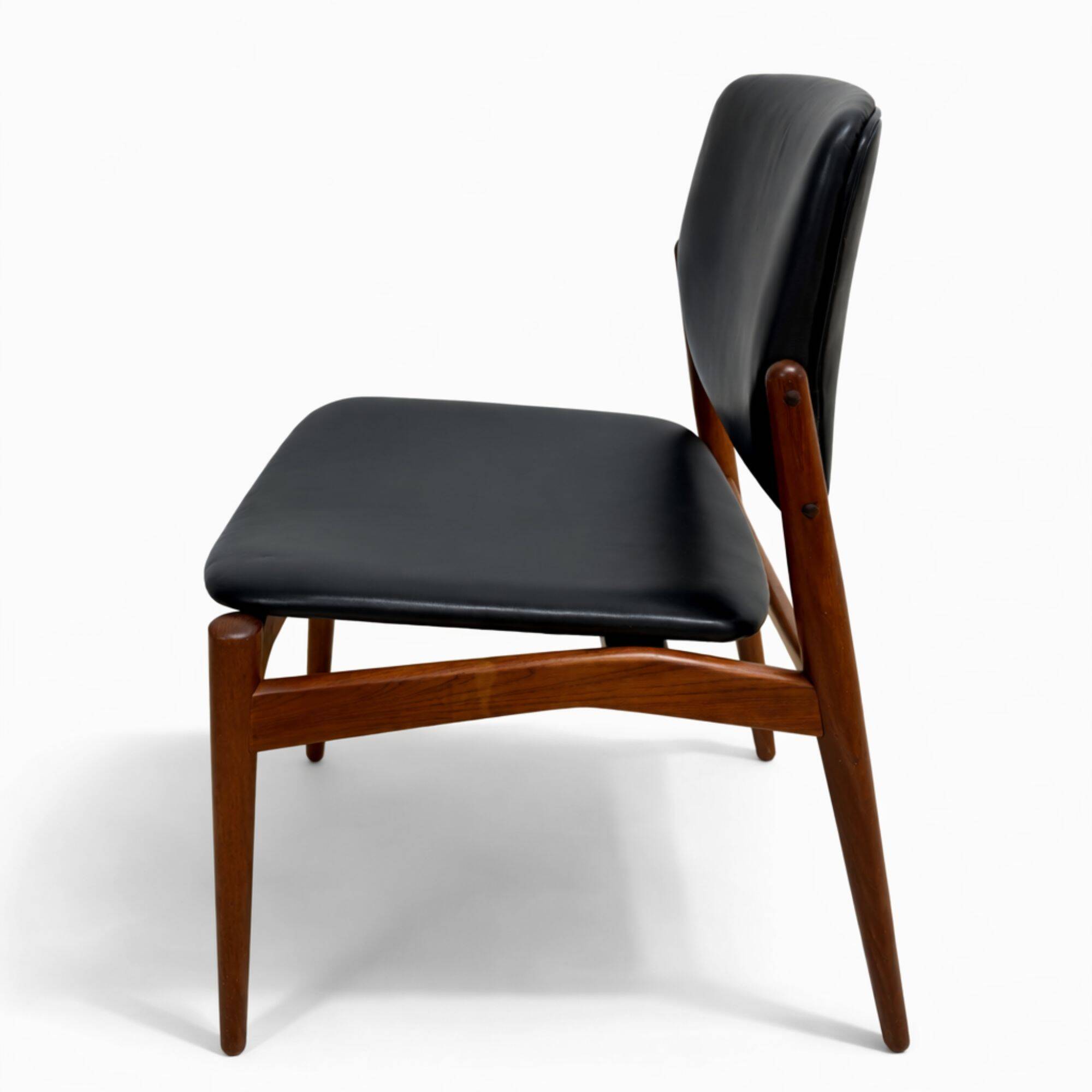 Captain chair pair by Erik Buch