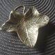 Empty ashtray pocket sheet in bronze