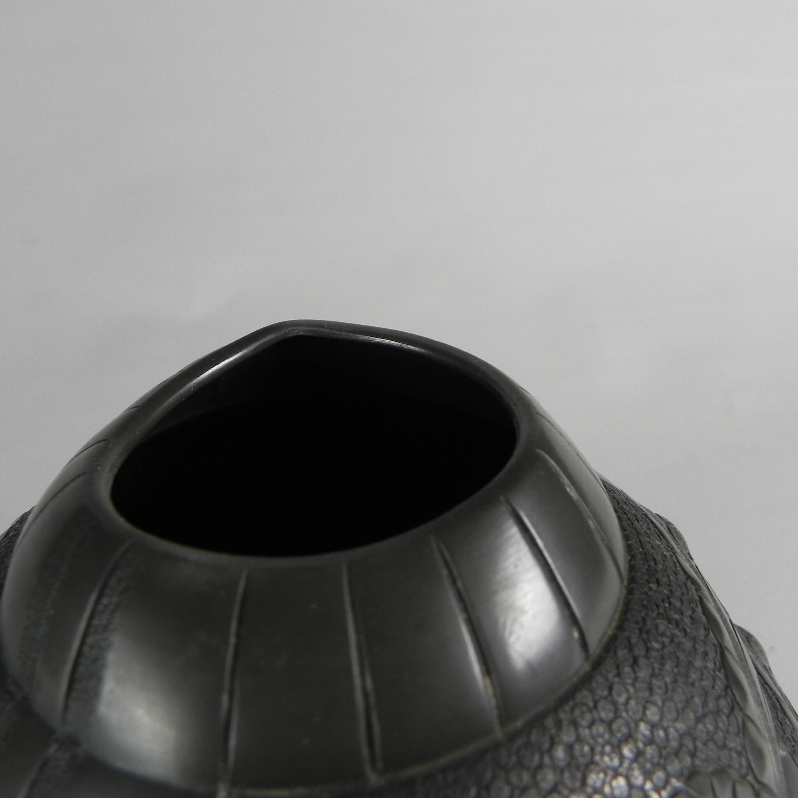 Art Nouveau pewter vase, signed PETIZON, early 20th century.