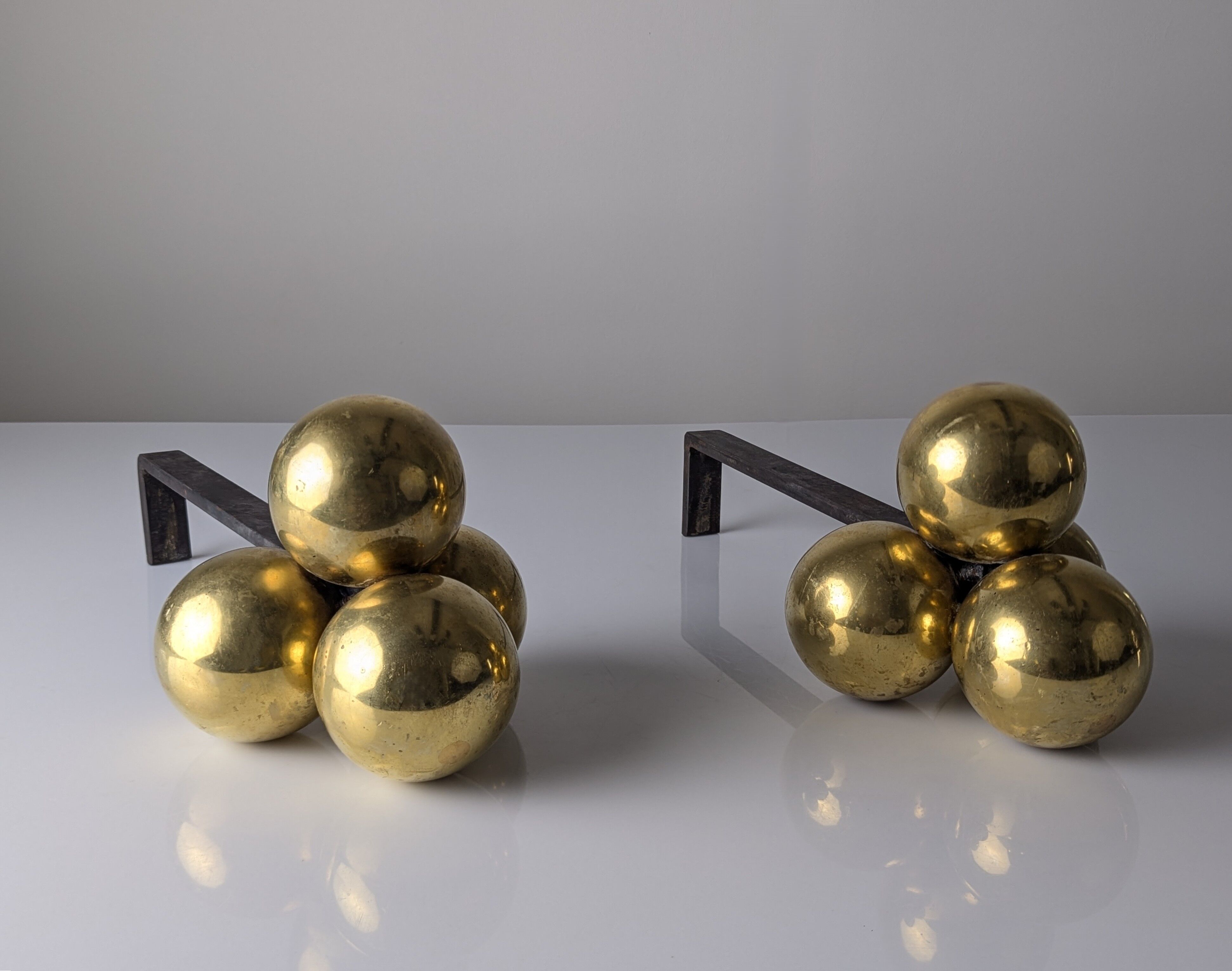 Bronze and wrought iron andirons by Jacques Adnet, 1930s
