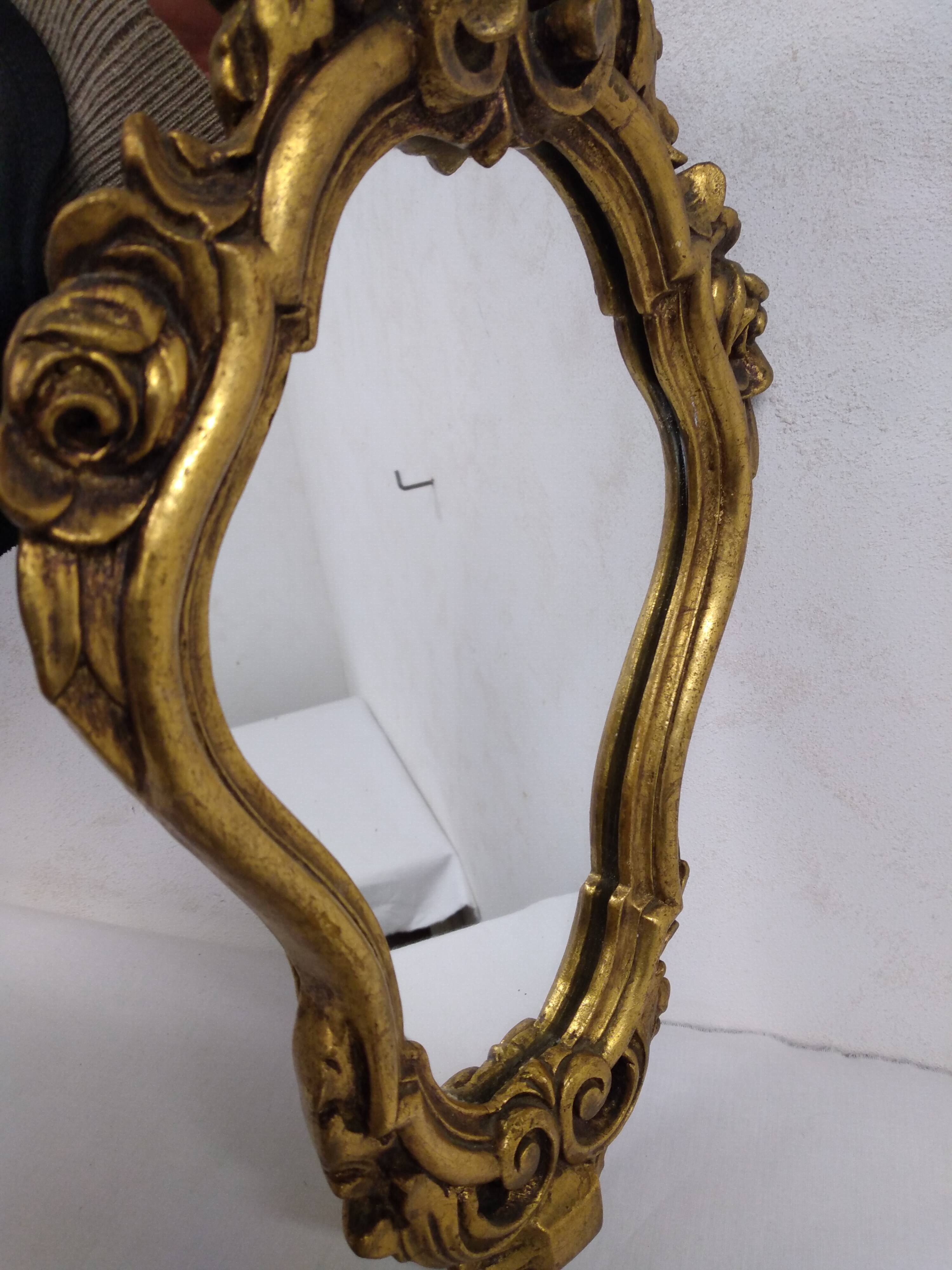 Gold stucco rocaille style mirror