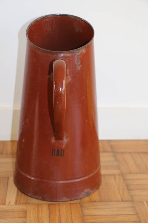 Brown enamelled steel pitcher