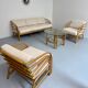 Complete living room with rattan sofa and white bouclette, brass finish, 80's design