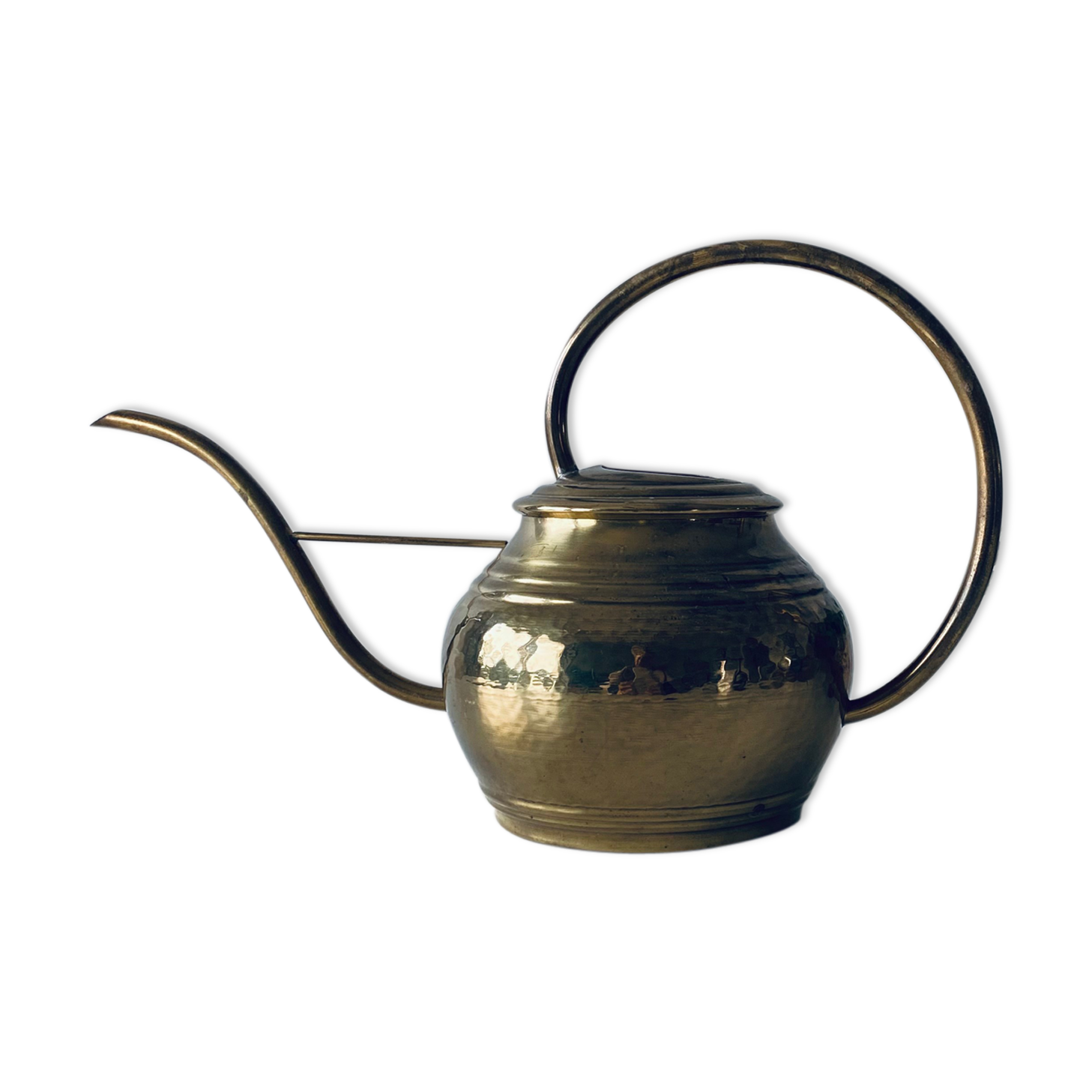 Old brass watering can