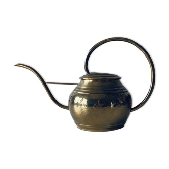 Old brass watering can