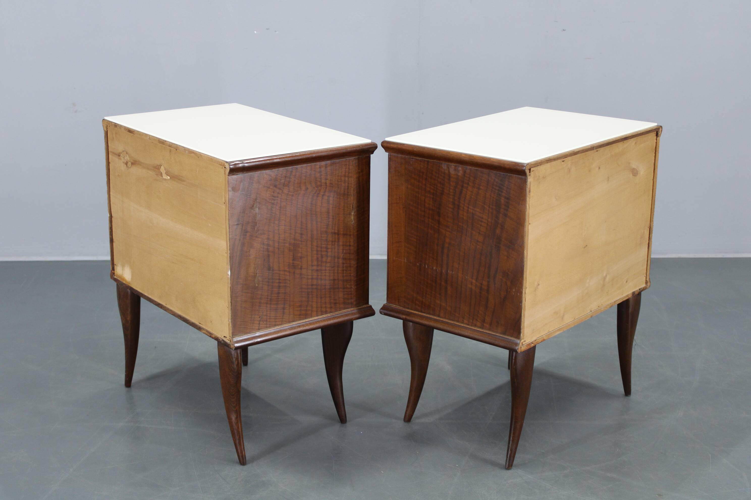 Pair of mid-century Italian walnut nightstands with glass top, 1950s