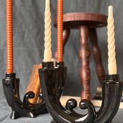 2 black ceramic candle holders