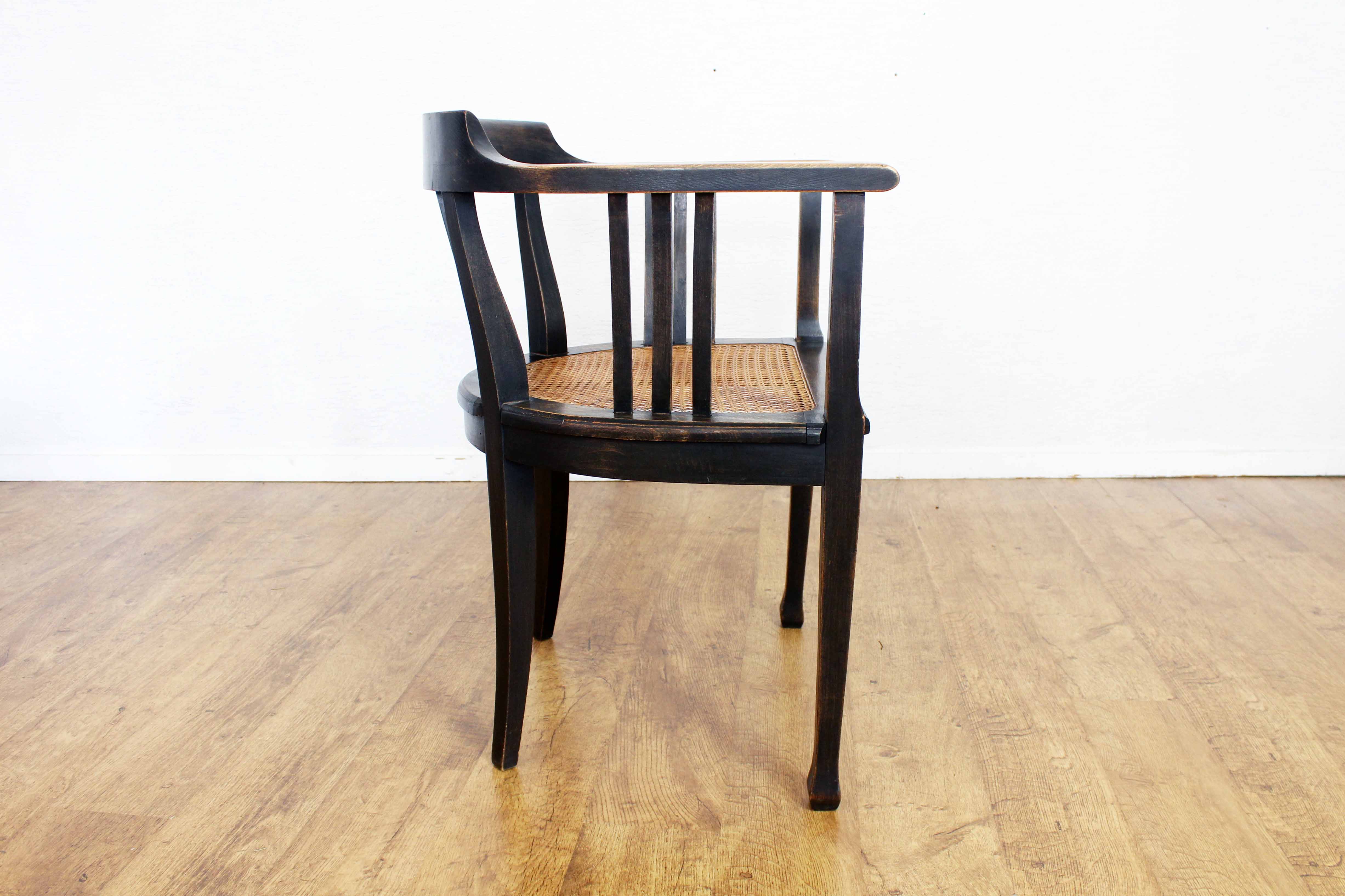 Old chair made of solid wood and caning