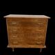 Commode en chêne pied compas