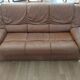 three-seater sofa and two armchairs