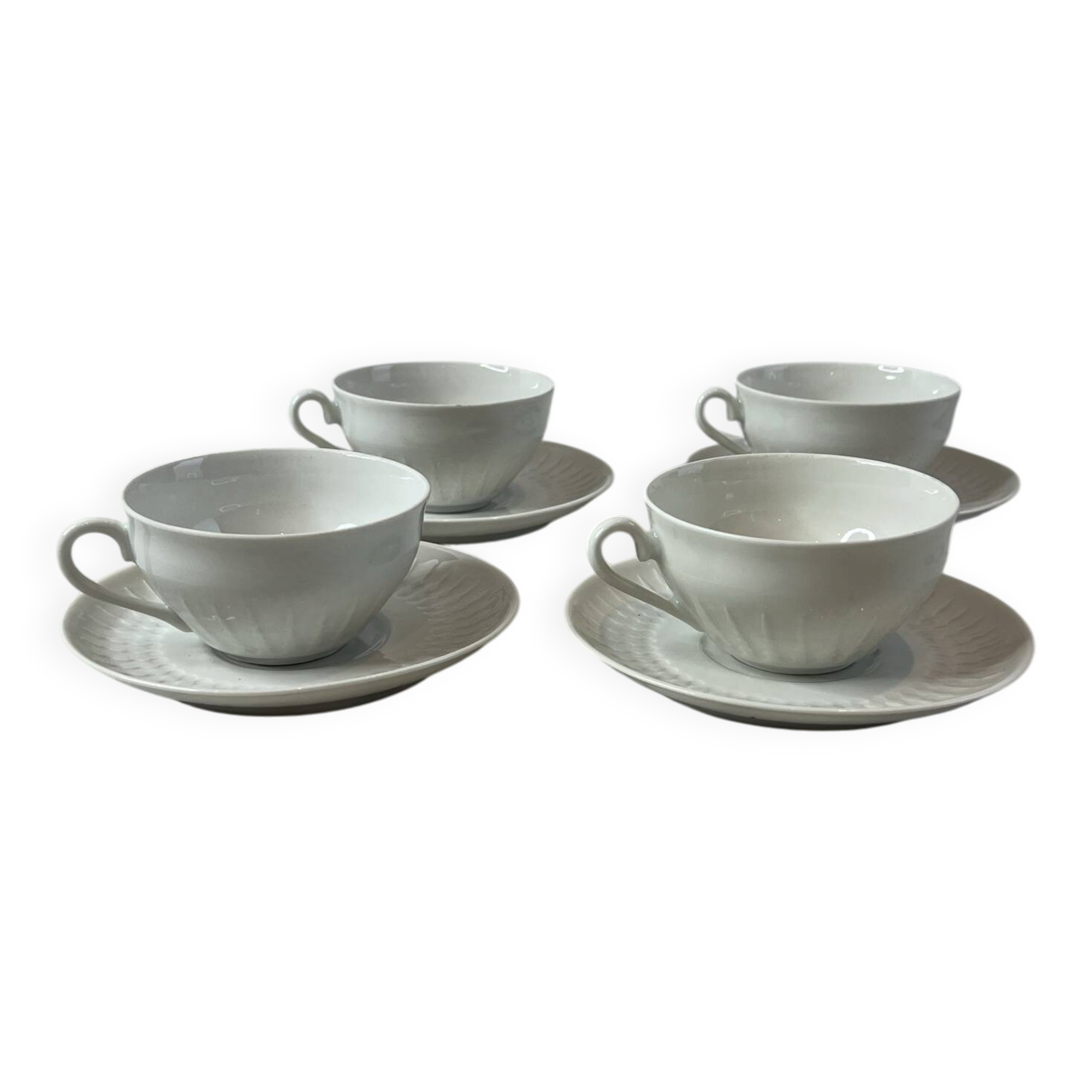 Set of 4 porcelain cups and saucers F. Chauvigny