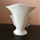 Porcelain vase with 2 soliflores