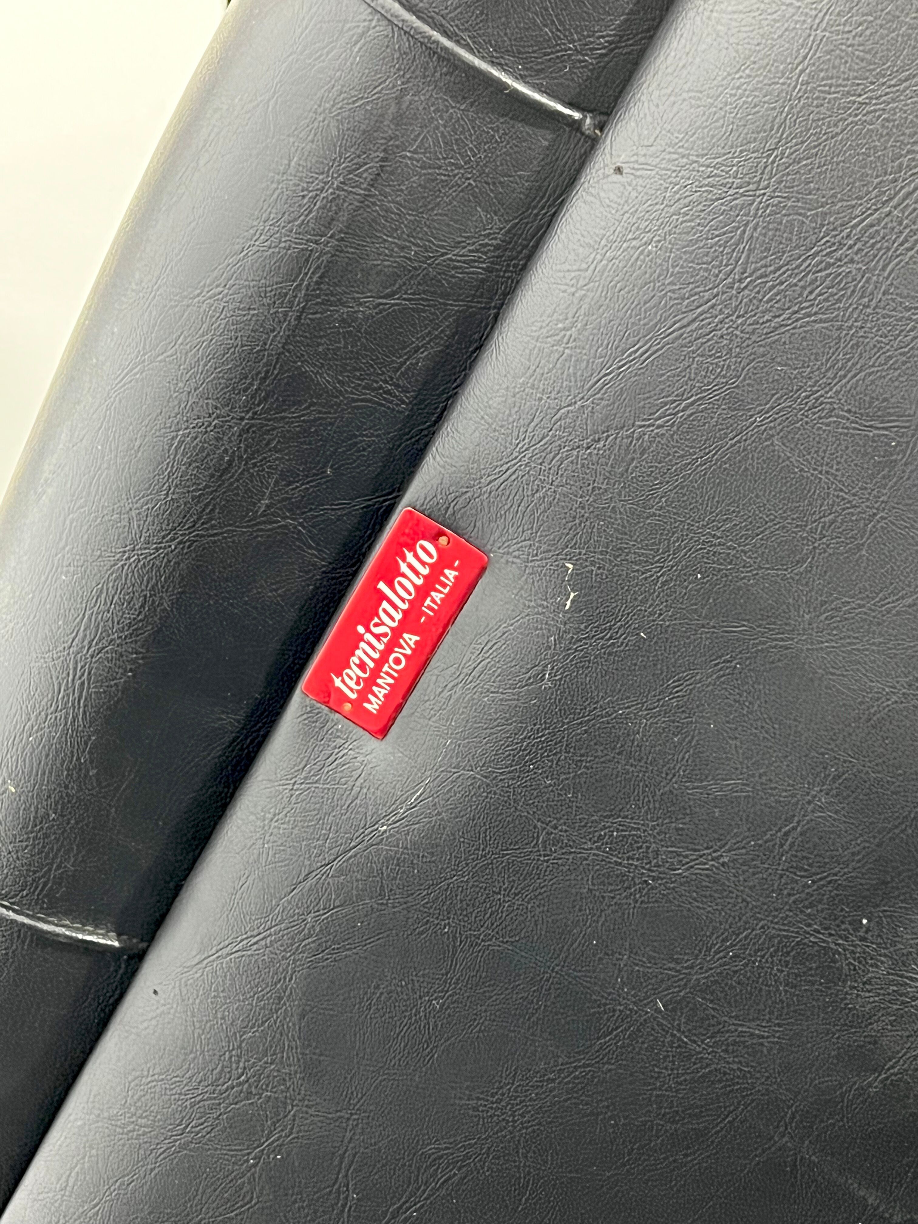 Vintage Italian black swivel armchair from 60s