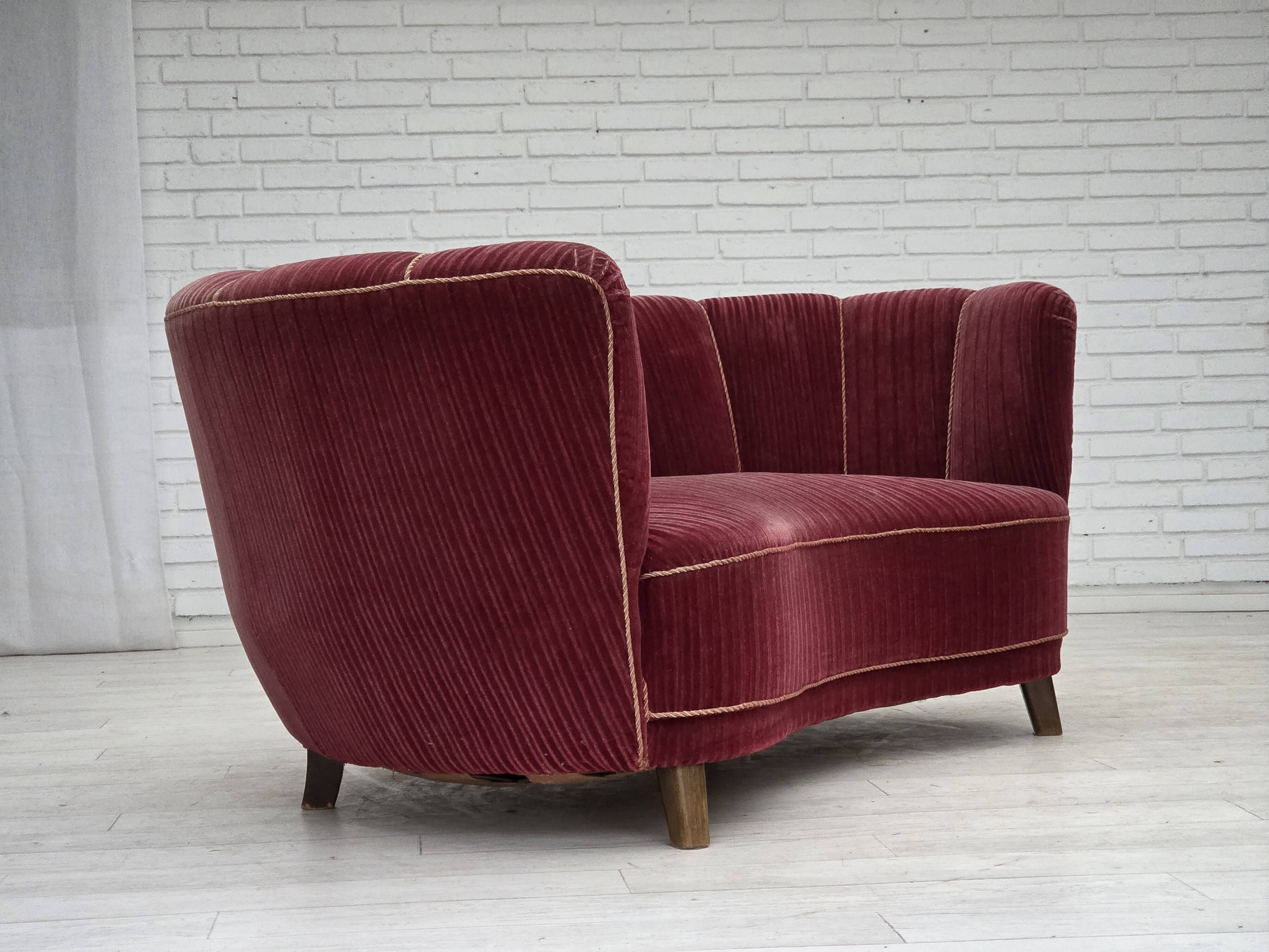 1960s, Danish 2-seater "Banana" sofa, red furniture velour, oak wood.