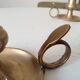 Antique hand candlestick in solid gilded brass.