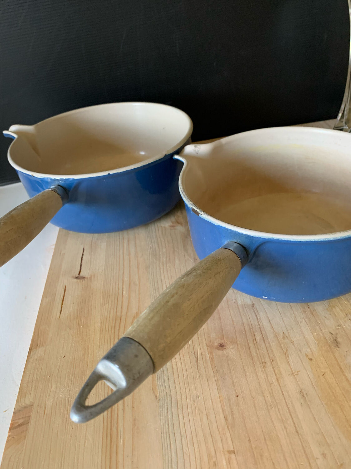Series of cast iron pans Le Creuset bleues