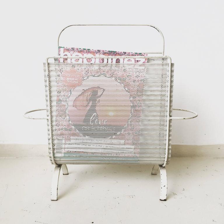 Modernist magazine rack by Mathieu Matégot to 1952