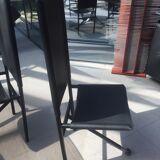 Set of 6 dining room chairs with tripod legs in grained leather and metal 1970