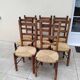 8 vintage straw chairs in the style of Charlotte Perriand.