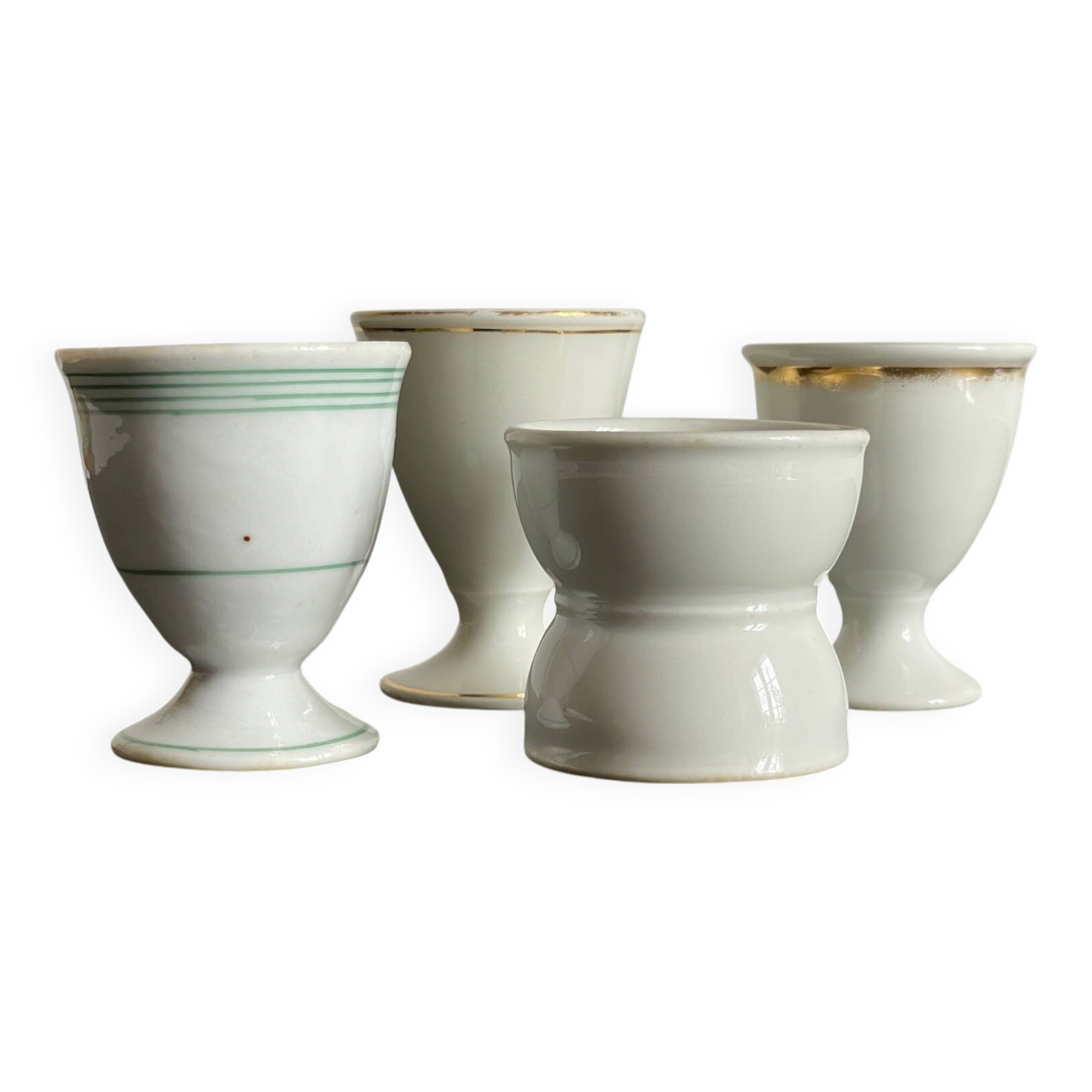 4 antique ceramic egg cups