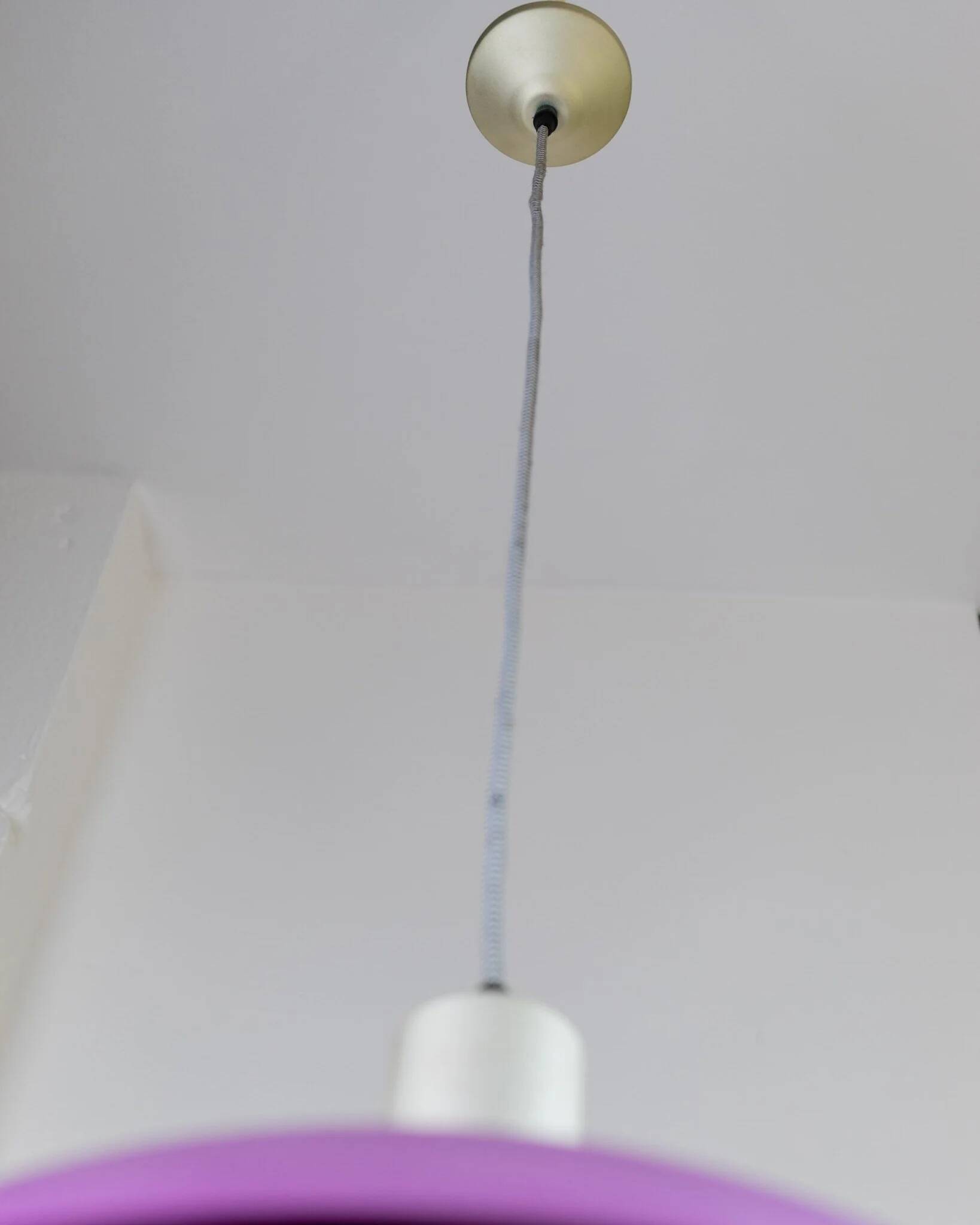 Vintage metal ceiling suspension – postmodern Memphis style from the 1980s, purple, green, silver, striped cable, Pop Art interior, retro light fixture.