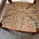 Vintage wooden armchair and straw seat for children
