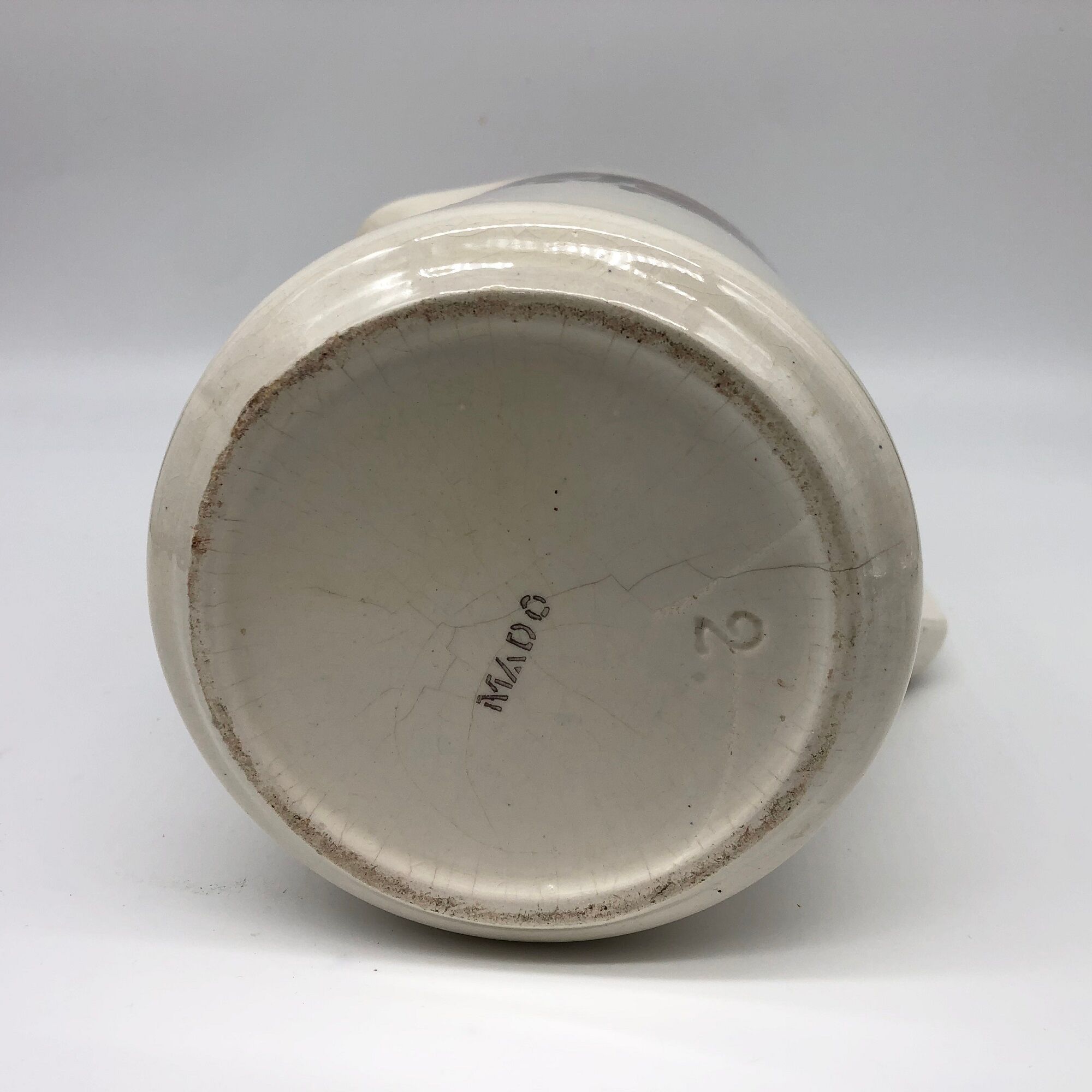 Old ceramic broc stamped "Mado"