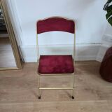 Chaise pliante en métal doré et velours rouge