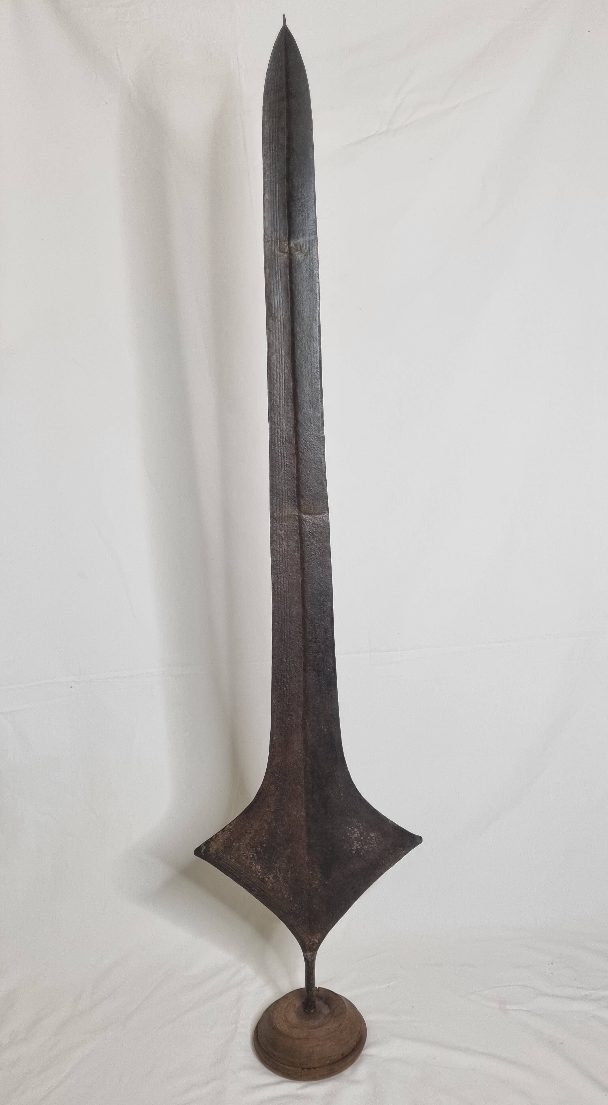 Large Topoké coin, also known as Liganda, wrought iron, sculptural, late 19th century, 160 cm