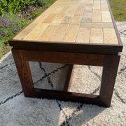 Vintage coffee table in rosewood and ceramic.