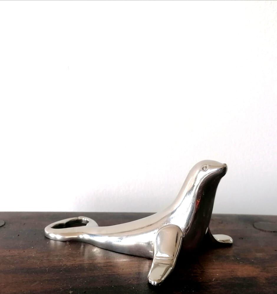 Silver metal seal bottle opener