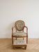 Armchair and footrest set in Louis XVI style