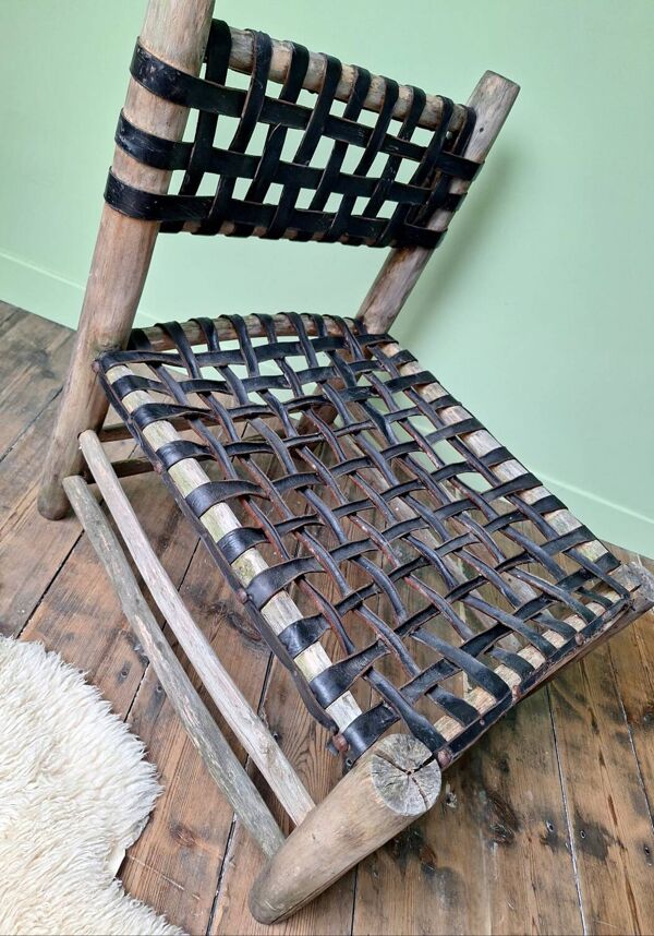 Chauffeuse vintage en cuir tressé et bois