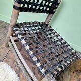 Vintage armchair in woven leather and wood