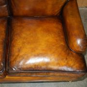 Howard & Son restored leather canapé, width 145 cm