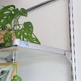 Chrome and glass wall shelf, circa 1960