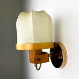 Pair of articulated "Cocoon" wall lights, resin and pine, Italy, 1970s