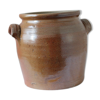 Ancient jar in sandstone glossy ears