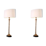 Pair of table lamps, patinated brass finish and black granite base, beautiful quality and sought-after style.