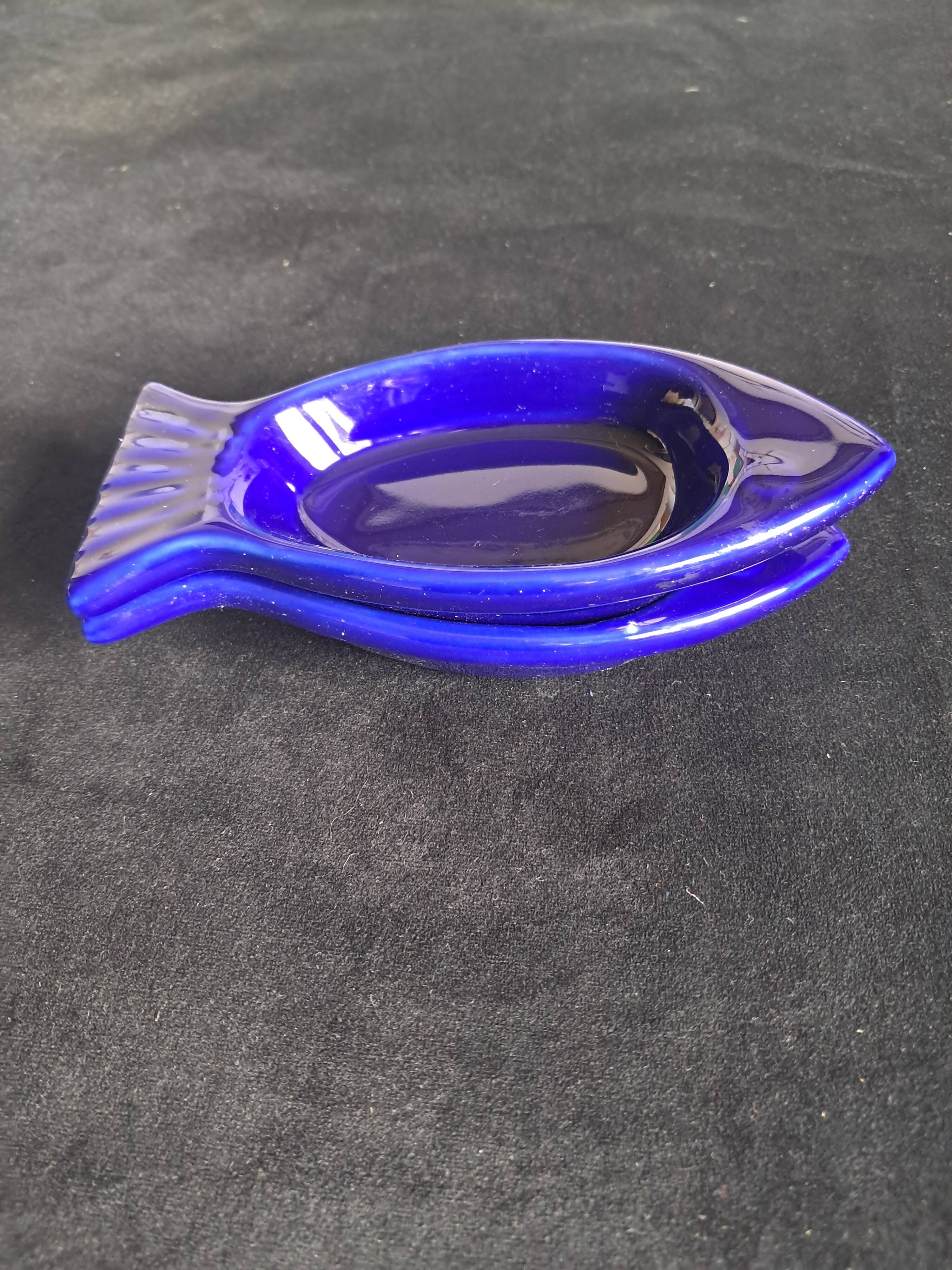 Cobalt blue ceramic plates in the shape of fish (tapas, anchovies, etc.)